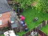 Moment suspect jumps garden fences in dressing gown to try and flee police captured in drone footage